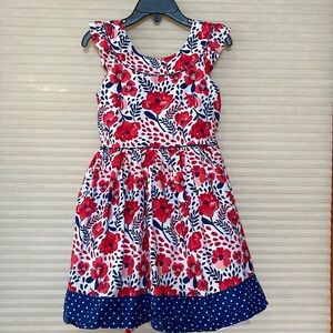 red and navy flower dress ruffle sleeves with tie to go around back Size 6